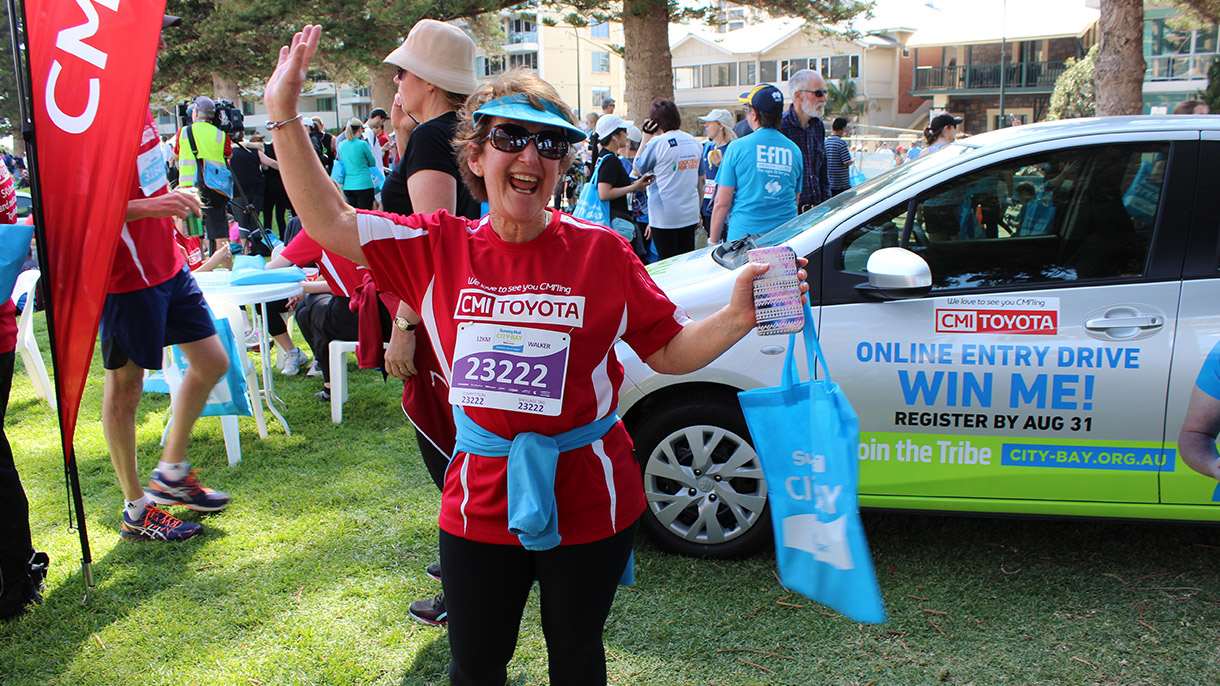 Happy woman runner at City Bay Fun Ruy 2017