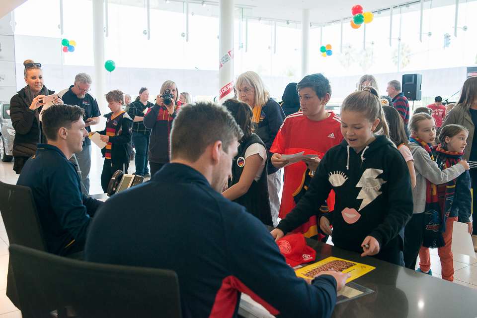 Josh Jenkins and Jake Lever signing autographs for the fans