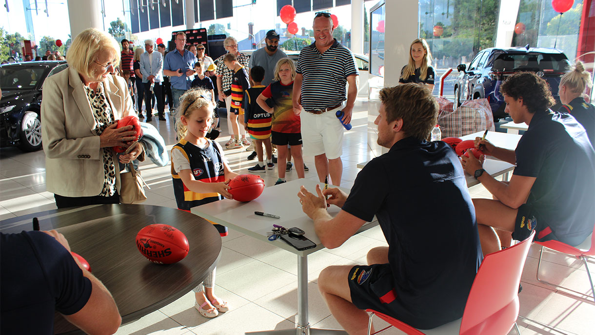 Signing footballs